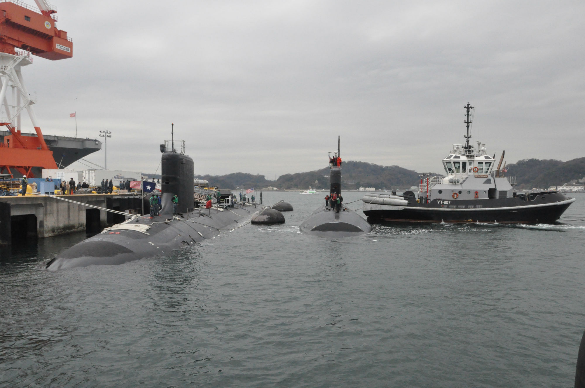 USS Charlotte (SSN 766) moors outboard of USS Texas (SSN 775)